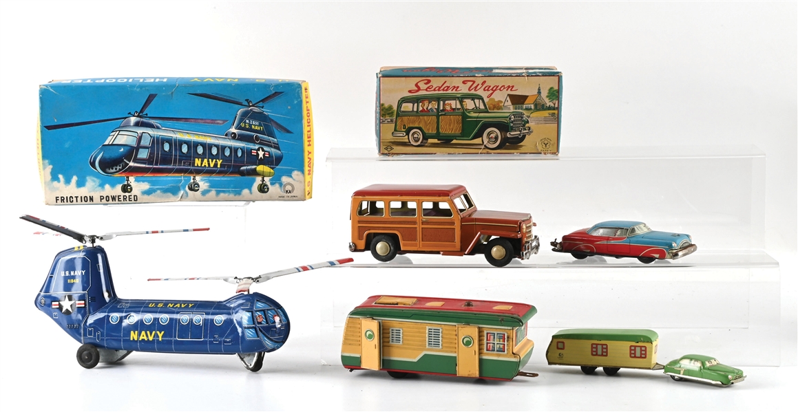 LOT OF 4: TIN CARS WITH CAMPING TRAILERS, U.S. NAVY HELICOPTER AND SALON WAGON W/ ORIG. BOXES