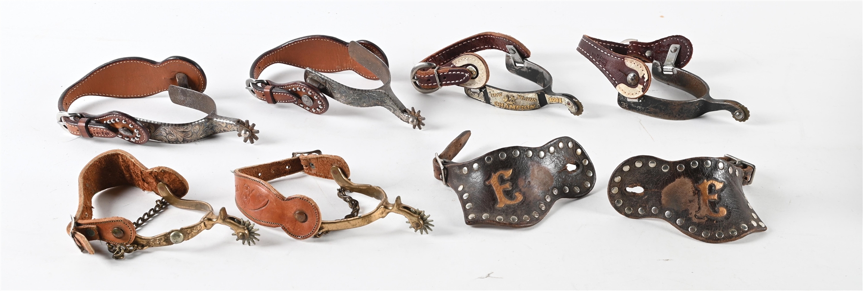 LOT OF 4: VARIOUS SPURS AND PAIR OF SPUR STRAPS