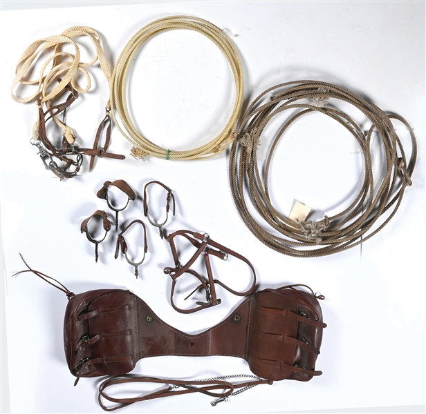 LOT OF 7: VARIOUS ROPES, SPURS, BRIDLES AND SADDLE BAGS